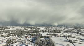 Cold Spell Arrives Bringing Spectacular Curtains of Snow This Morning,- clip 1