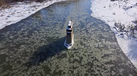 Ice pancakes float down river in southern Ontario