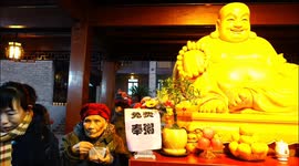 People receive the BUDDHA porridge for free in Yichang, China