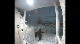 Woman Sighs in Defeat When Shoveling Snow