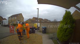Amusing doorbell footage shows workmen winning tug of war - with manhole