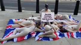 PETA activists stage “die-in” outside MOD against use of bear fur in King’s Guards’ caps