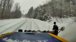 Driver's Risky Overtake Ends in Collision with Snowplow in New York, USA
