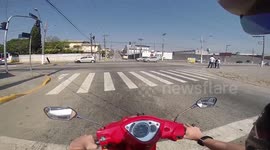 Scooter Crashes Into VW Beetle