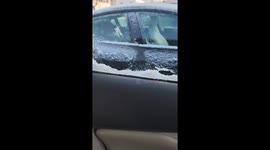 Frozen Car Door Traps Driver Inside