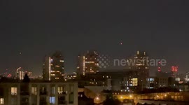 Strange orange lights spotted travelling in the sky above London