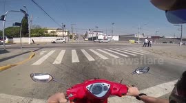 Scooter Crashes into VW Beetle