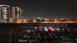 700 Tesla Cars Illuminate the Night in Solidarity for Kidnapped Israelis in Tel Aviv, Israel