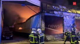 BomberosCM Fire crews Contain Industrial Fire in Madrid, Spain