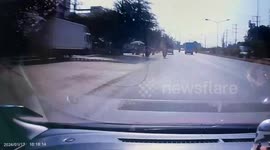 Jilted husband jumps onto wife's car windscreen on her way to file divorce papers