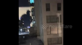 Startling shadow figure caught on camera in Los Angeles window recording