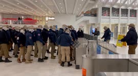 Neo-fascist demonstrators appear to have difficulty with train station turnstiles in New York City