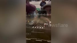Suitcase blows across airport apron during Storm Isha in Edinburgh