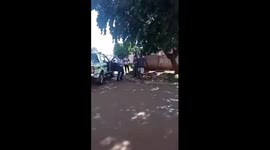 The South African police officer's being abused a angry citizen