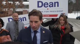 Dean Phillips greets voters at a polling site in Nashua, New Hampshire
