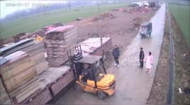 Husband's dramatic rescue saves wife from falling planks