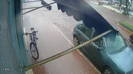 Slippery Sidewalk Ends Chase Between Dog and Cyclist