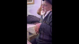 Chinese grandfather imitates Monkey King character during dinner