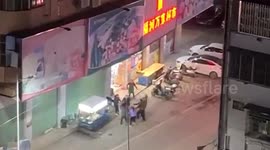 Brave crowds save falling child with canvas sheet in China