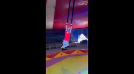 Adorable circus princess laughs at gravity with ASTOUNDING aerial tricks