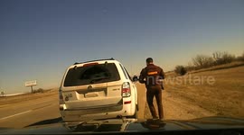 U.S. Highway Cop Goes Flying During Roadside Stop in Oklahoma City, OK, USA