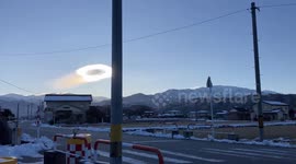 Spectacular glowing cloud illuminates sky in Japan