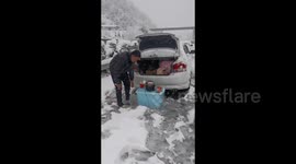 Snowstorm Stranded Travelers on Chinese Highway in Hunan, China