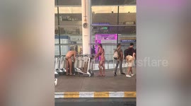 Aussie tourists spark outrage wearing leopard-print Speedos and thongs to Thai airport