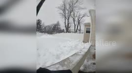 Police Officers Slip on Snow in West Seneca, NY, USA
