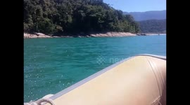 small boat going to island