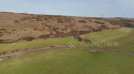 Drone footage shows one of the most scenic roads in Britain - just metres from a cliff edge