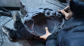 A craftsman carves Sizhou inkstone in Cengong County, China