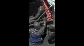 Youngsters covered in mud after crashing motorcycle into river