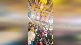 Woman, 45, killed and 17 people injured when stage collapses in India