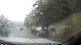 Car Narrowly Avoids Collision with Parked Cars and Pedestrians in Oregon, USA