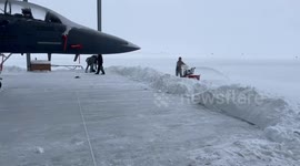 Mountain Home Air Force Base Soldiers Clear Snow Around USAF Jets in Elmore County, USA