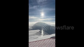Golden rays of the sun and reflecting off the snowscape in Altay Prefecture, China