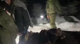 Indian Army officials evacuate pregnant woman in critical condition amid heavy snowfall in northern India