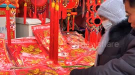 People Shop For Spring Festival Ornaments in Fuyang, China