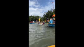 Woman tackles a circular boat adventure in Vietnam's coconut grove