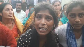 Bereaved families of India firecracker factory blast victims block roads in protest