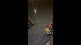 Schoolboys stuck in mud after crashing motorcycle into river