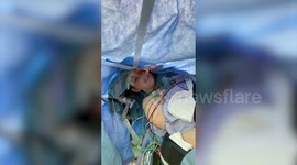 Woman sings and recites 50 US states as doctors perform brain surgery to remove tumour