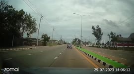 Wooden plank flies from back of pickup truck and hits oncoming car