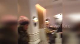 PETA animal rights protesters confront university boss in London