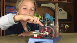 Slow Motion Steam Engine Mesmerises Young Boy filmed with iPhone 6s