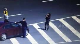 Family stop and take selfies in the middle of a motorway