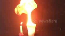 Candle flame ignites acetylene gas in slow motion