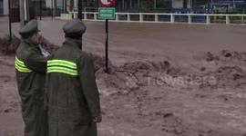 Floods after rain hit Santiago