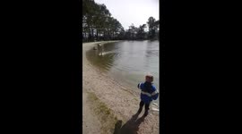 Adorable footage of a toddler scared of a remote-control jet ski